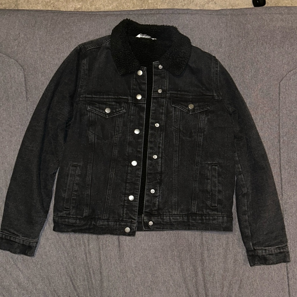 A medium fur-lined black denim jacket from Highway Jeans.